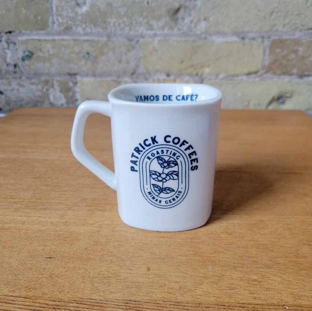 Patrick Coffees - A Brazillian Coffee Company White Ceramic Mug Blue Graphic